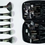 Open makeup brush set bag showing interior organization by MB Cosmetics BZ