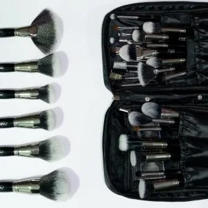 Open makeup brush set bag showing interior organization by MB Cosmetics BZ
