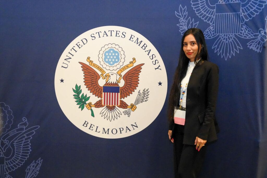Madeleine Posing in front of the American Crest during YLAI Summit in Belize Madeleine Posing in front of the American Crest during YLAI Summit in Belize